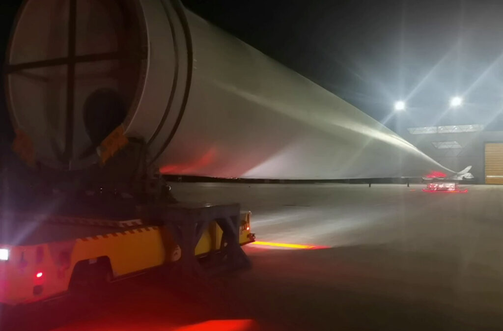 how dual vehicle agvs solve the mega challenge of 100 meter wind turbine blade transport 2