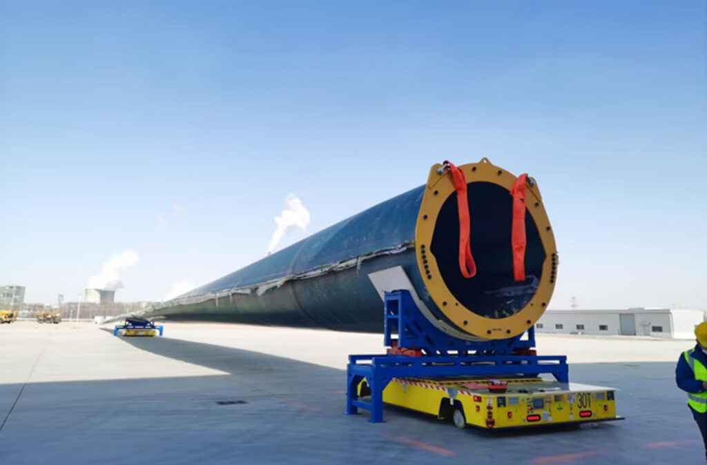 how dual vehicle agvs solve the mega challenge of 100 meter wind turbine blade transport 4