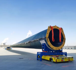 how dual vehicle agvs solve the mega challenge of 100 meter wind turbine blade transport banner