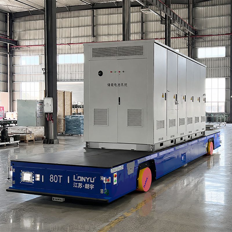 Lonyu 80-ton heavy duty AGV transporting a large energy storage container in a manufacturing facility.